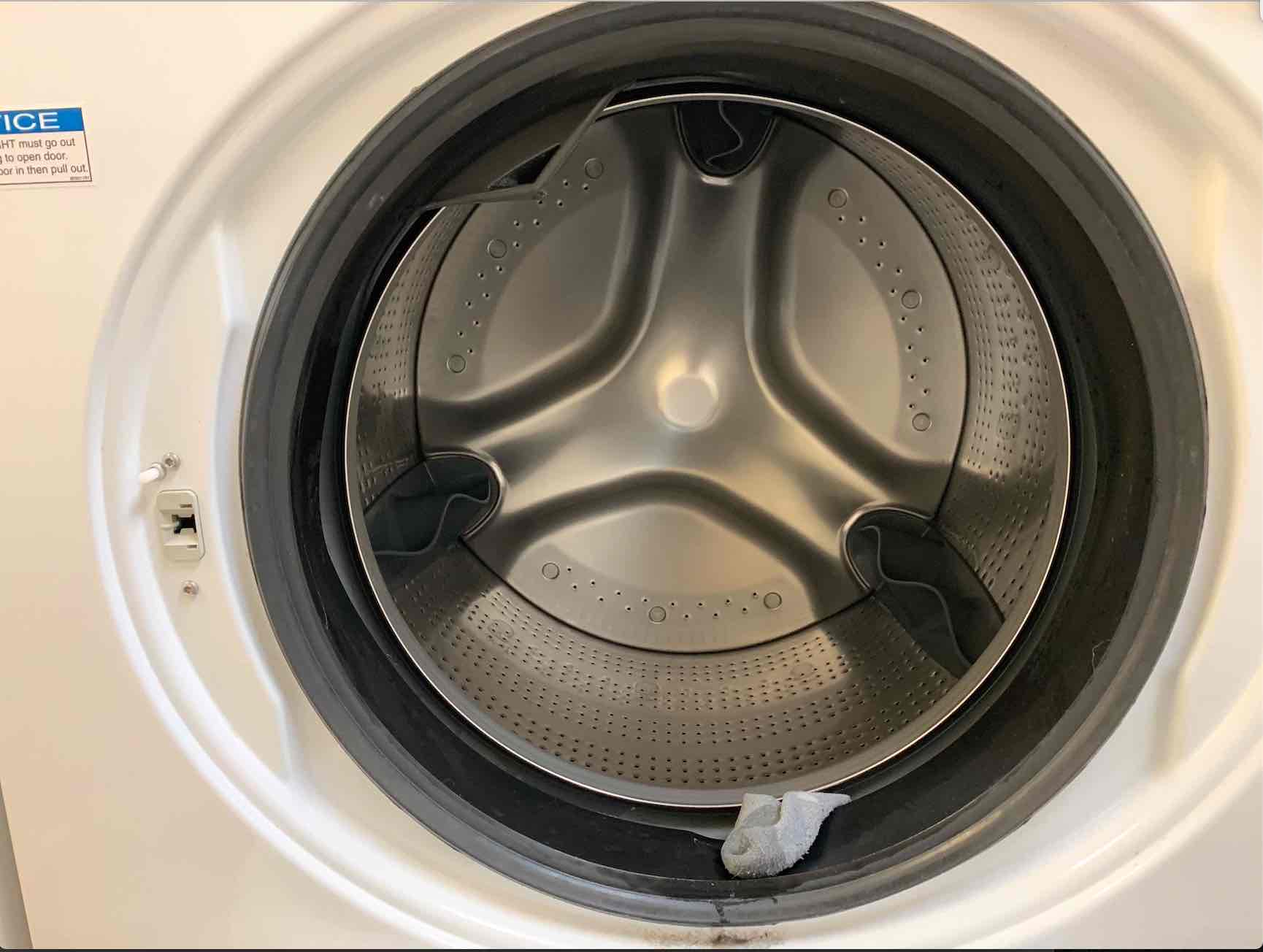 Tragic Wet Sock Is Really Stuck In Between Washing Machine Door and Barrel CU Noozfeed